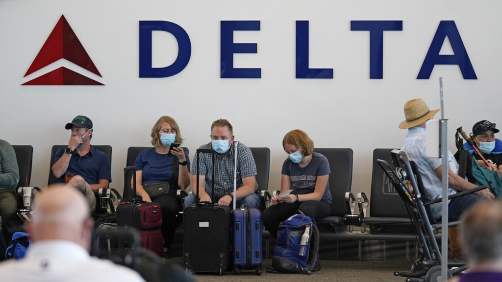 Delta Air Lines will make unvaccinated employees pay surcharge for health insurance - Portland Press Herald